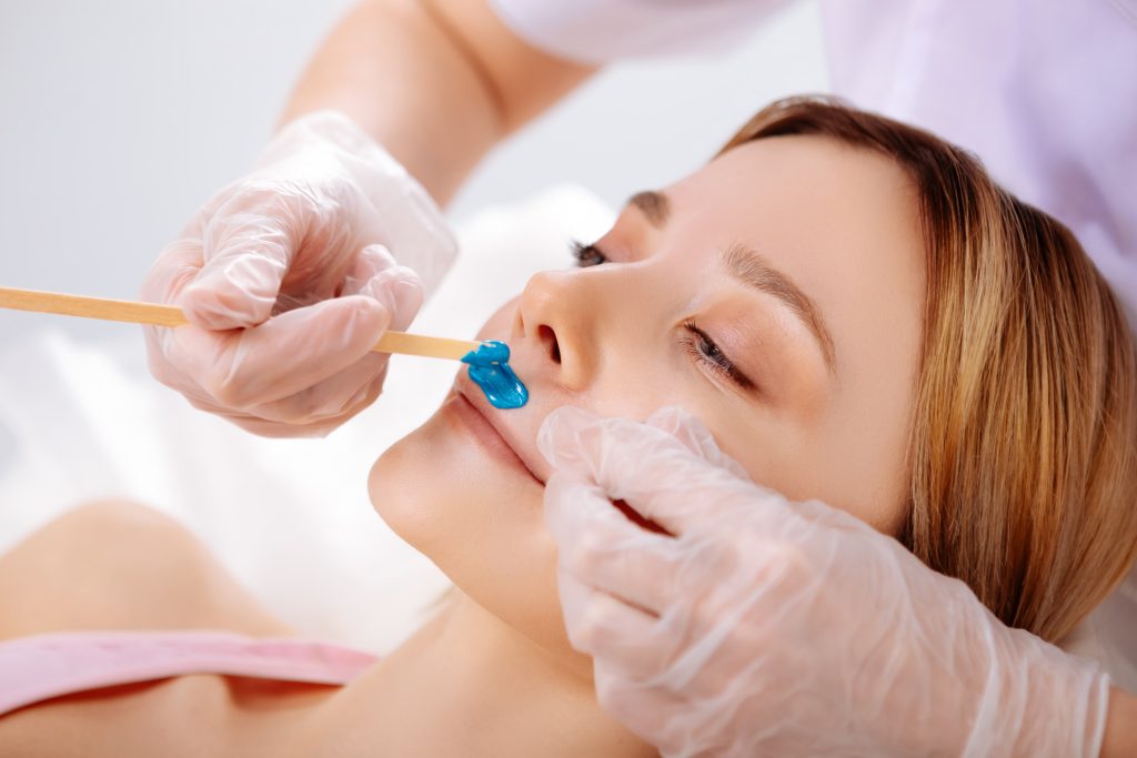 stock image woman getting waxed